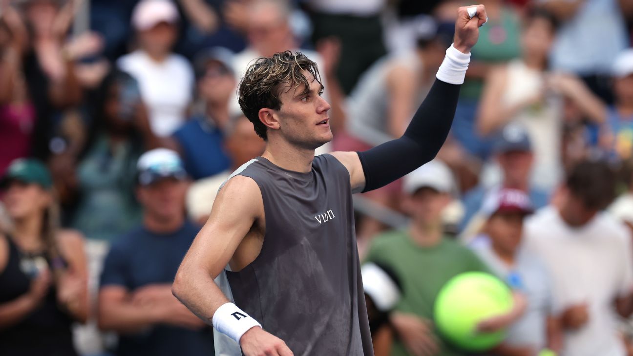 US Open: Jack Draper holds nerve to reach second round