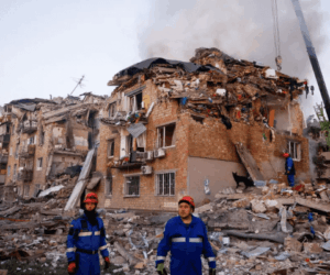 Russia pounds Kyiv with missiles, killing 14 people including four children