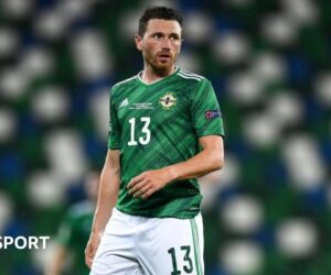 Corry Evans: Northern Ireland midfielder announces retirement to take up coaching role