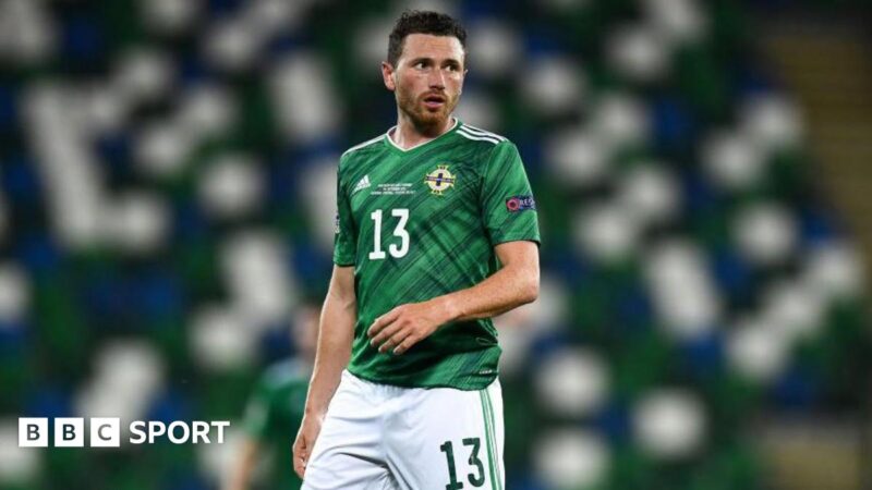 Corry Evans: Northern Ireland midfielder announces retirement to take up coaching role