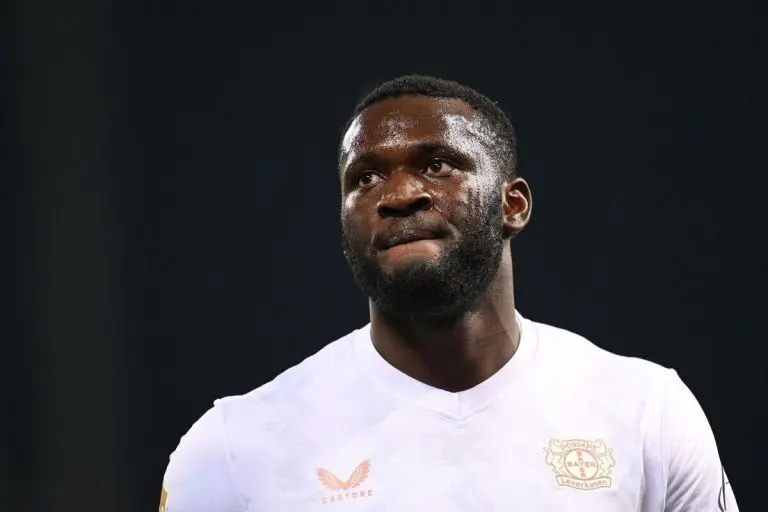 Boniface returns to Germany as Milan delay transfer decision