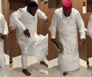 Groom hilariously showcases his less-than-thrilled reaction to his traditional wedding outfit (WATCH)