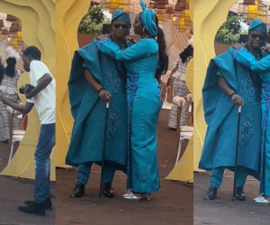 Hilarious moment a groom was taught how to pose with his bride by a photographer (WATCH)