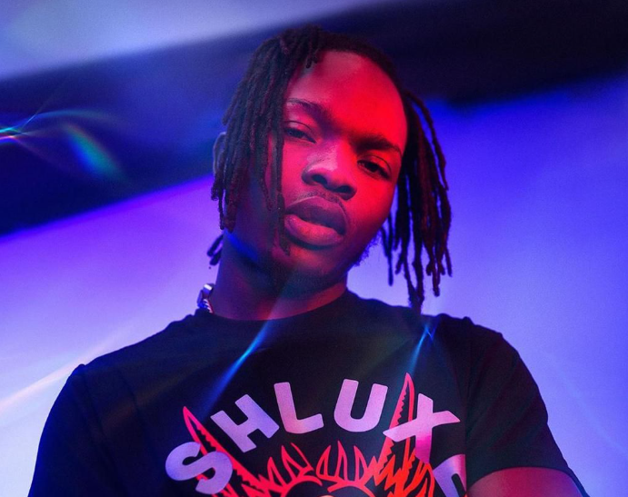 VIDEO: Fan attacks Naira Marley at Benin Republic concert