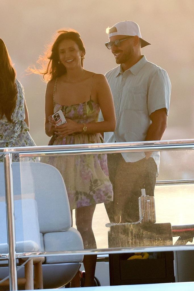 Newly single actress Nina Dobrev cozies up to actor Zac Efron in flirty vacation pics