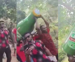 Ghanaian man buried in bottle-shaped casket, netizens react
