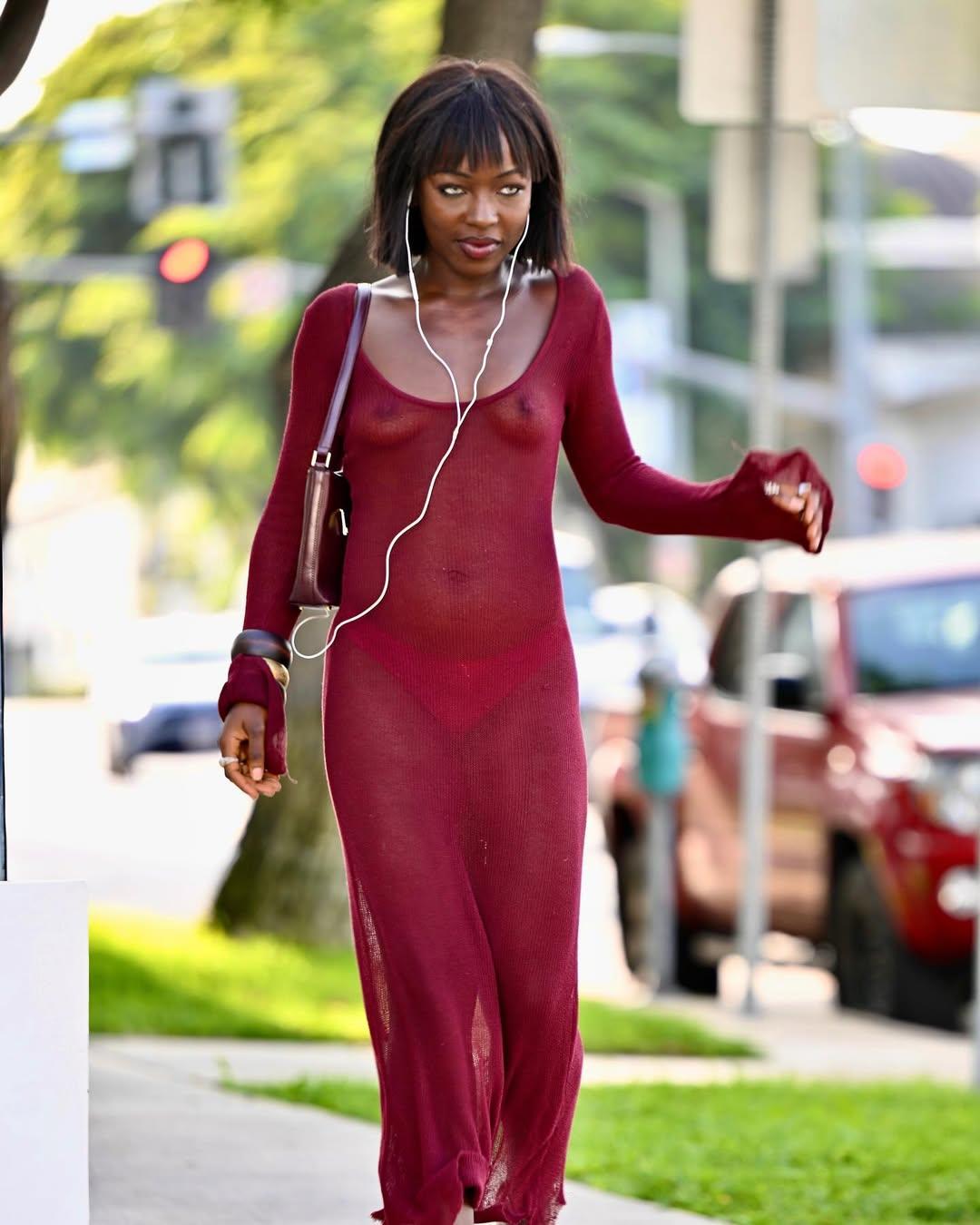 Kenyan comedian Elsa Majimbo faces backlash as she steps out without bra in see-through dress (photos)