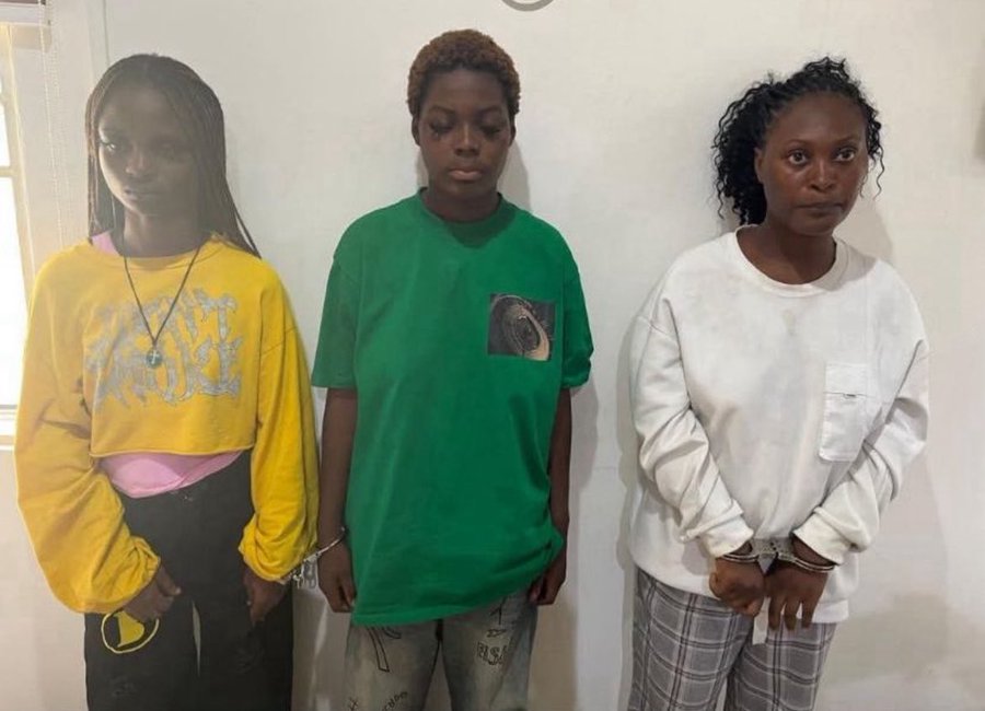 Police parade three ladies for assaulting, stripping their friend