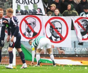 Dundee vs. Celtic halted after fans throw balls onto pitch