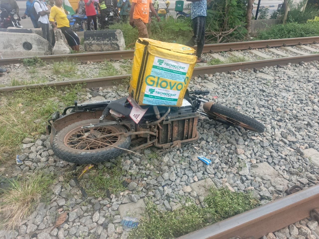Train crushes dispatch rider to de@th in Lagos (photos)