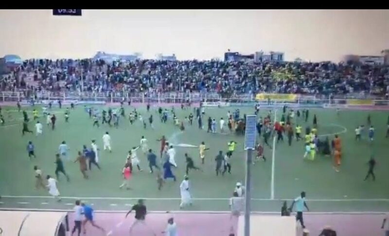 BREAKING: Angry Kano Pillars Fans Attack Referee, Shooting Stars Players, Officials After Late Equaliser In Kano NPFL Match