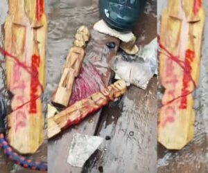 Lady sparks buzz after separating wooden images tied with red rope, exposes names