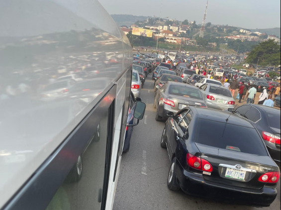 PHOTOS: Abuja Commuters Stranded, Motorists Trapped As Police Disperse Protesters