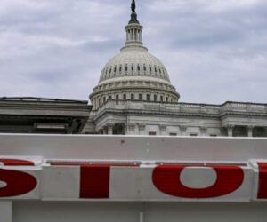 Asian stocks mixed, Wall St futures drop as US heads for shutdown