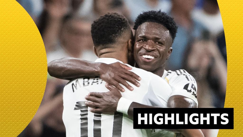 Vinicius scores twice as Real Madrid move top