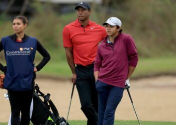 McIlroy trails Lowry in India after ditching driver