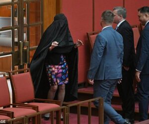 Australian politician branded racist for wearing a burqa to Senate as she seeks to ban face coverings (Photos)