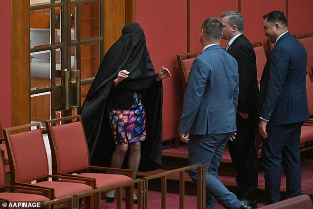 Australian politician branded racist for wearing a burqa to Senate as she seeks to ban face coverings (Photos)