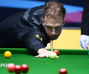 Judd Trump beats Bai Yulu to reach Champion of Champions quarter-finals
