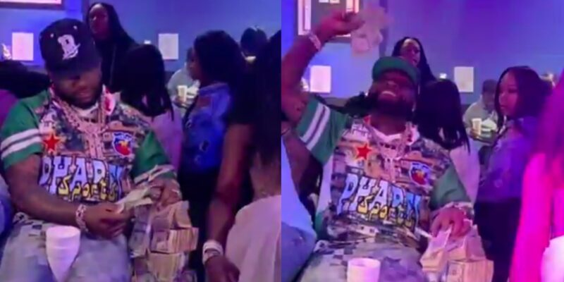 Davido lights up 33th birthday celebration party as he sprays dollars nonstop