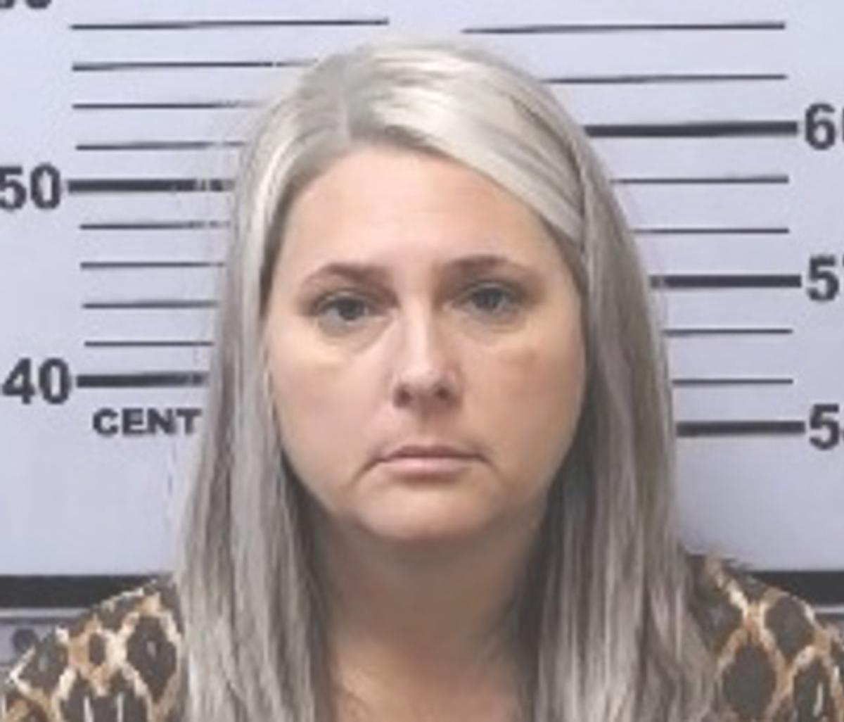 Teacher of the year arrested and fired after video showed her beating her son